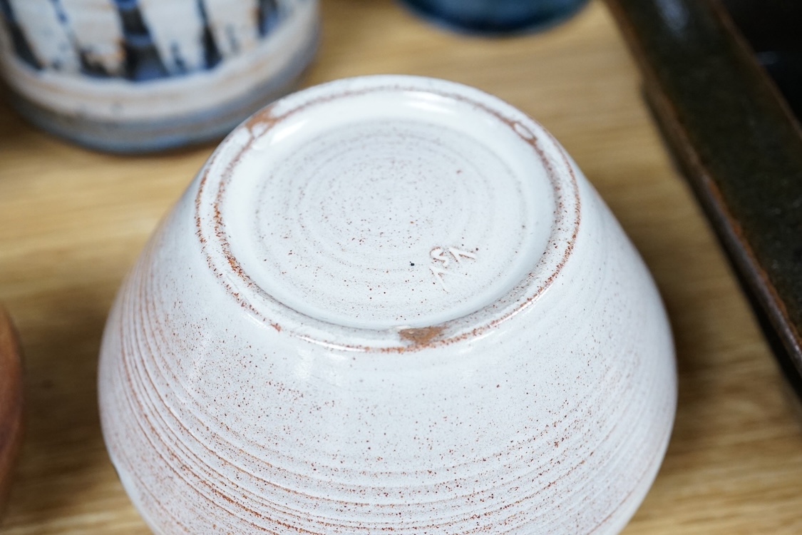 A collection of studio pottery to include a Celtic pottery Newlyn goblet, various jugs and bowls, largest 19cm high